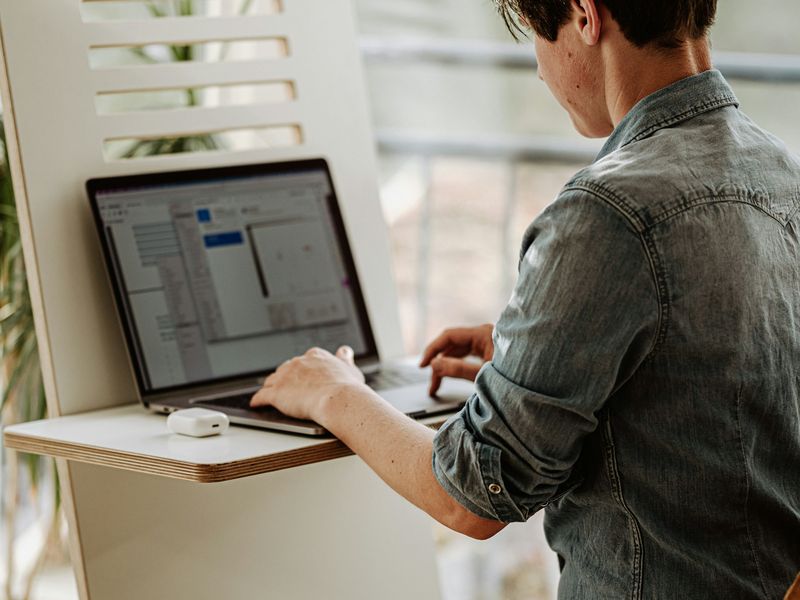 Man working on a laptop at a desk